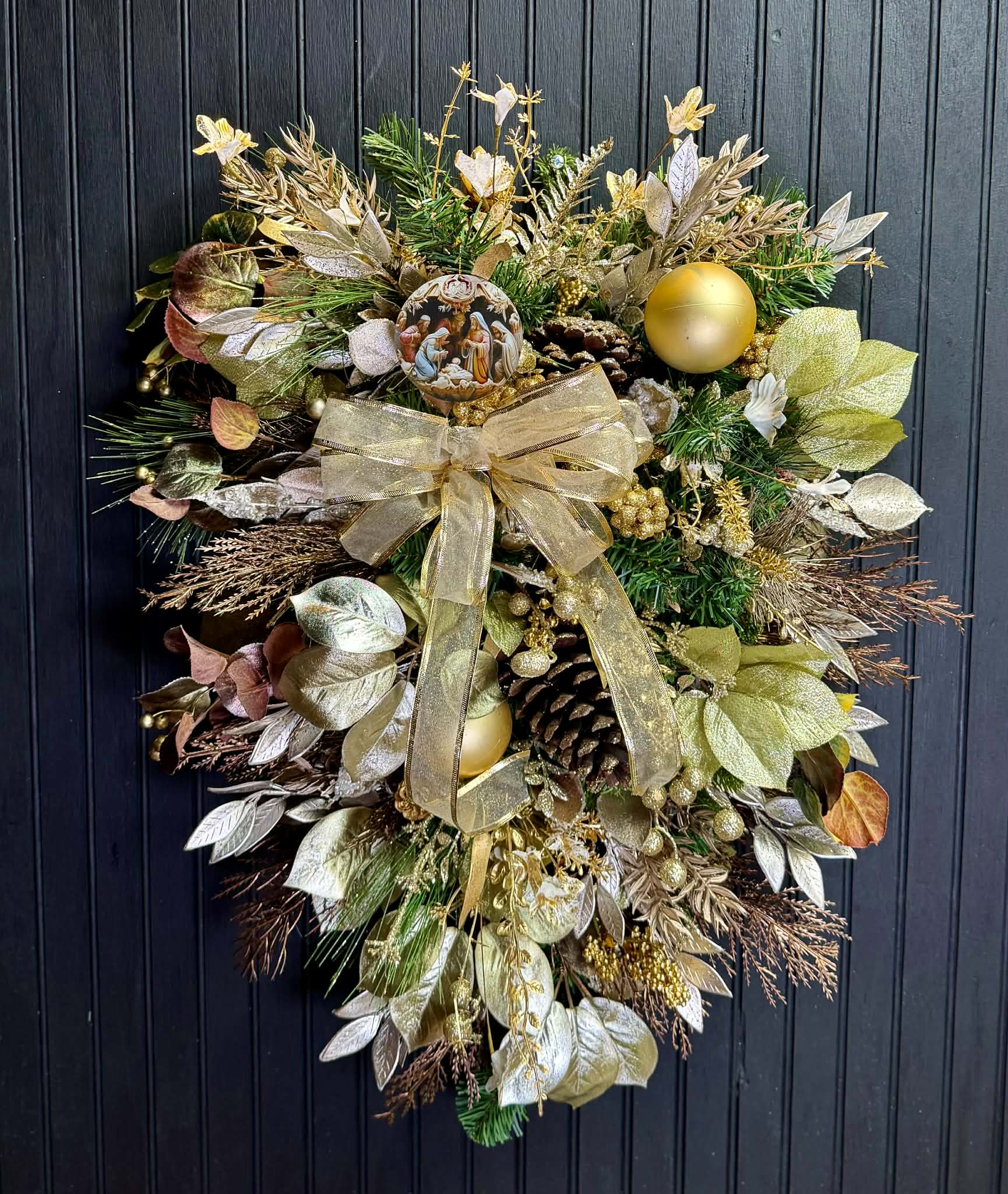 Gold, Bronze and Green 30" Swag with Nativity Ccene Ornament - Winter Leaves, Frosted Pinecones